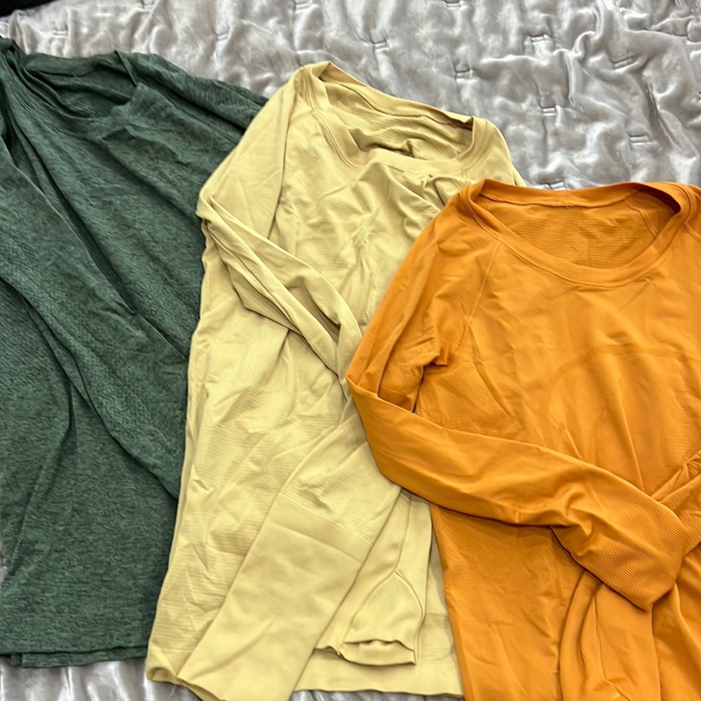 Three. Lululemon swiftly tech a long sleeve, size 6.